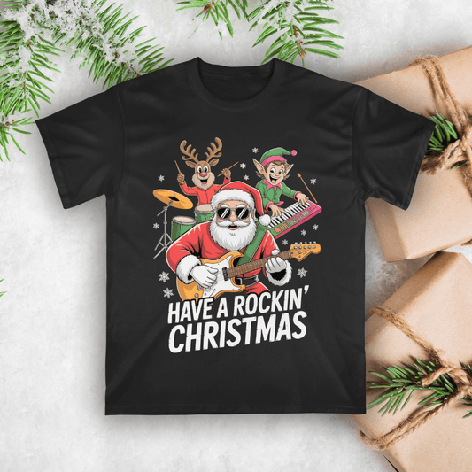 Black t-shirt with Santa playing guitar and elves, surrounded by Christmas decorations.