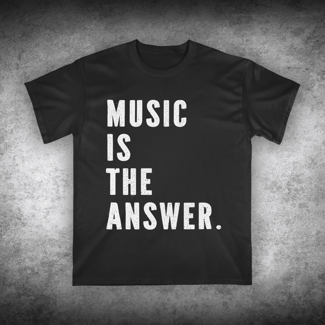 Black t-shirt with 'Music is the Answer' text on a textured gray background