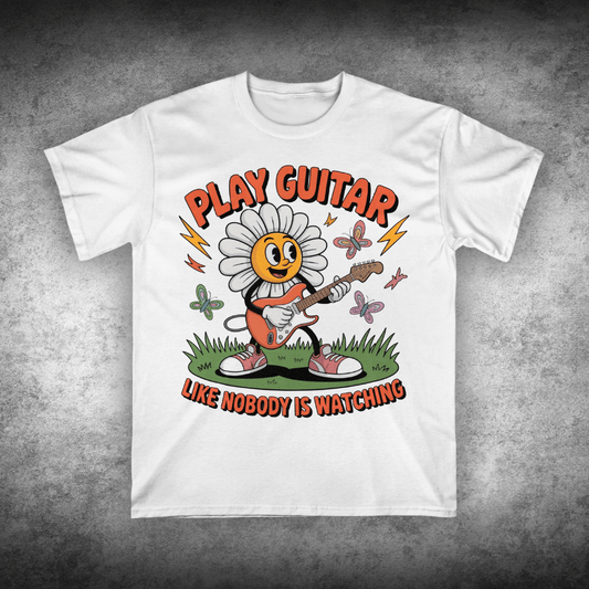 White t-shirt with a cartoon character playing guitar and text on a gray background