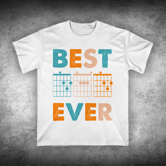 White t-shirt with colorful 'Best Ever' text and guitar chord symbols on a textured gray background