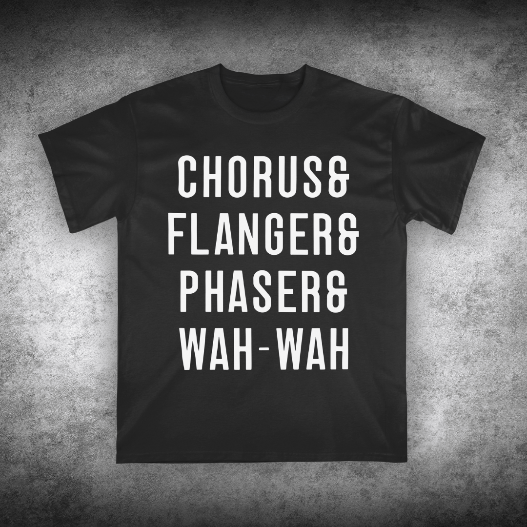 Black t-shirt with white text on a textured gray background