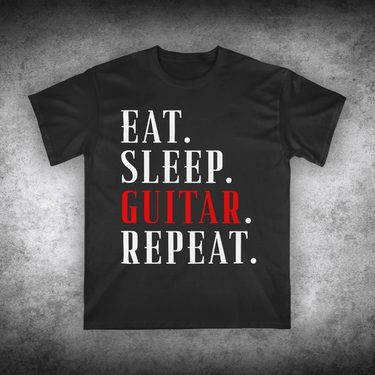 Black t-shirt with 'Eat. Sleep. Guitar. Repeat.' text on a textured gray background