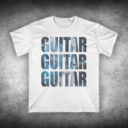 White t-shirt with 'GUITAR' text design on a textured gray background