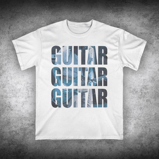 White t-shirt with 'GUITAR' text design on a textured gray background
