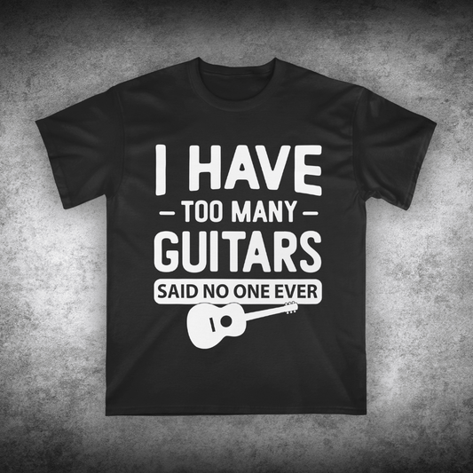 Black t-shirt with white text and guitar graphic on a textured gray background