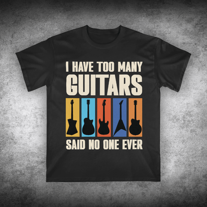 Black t-shirt with guitar graphic and text on a textured gray background