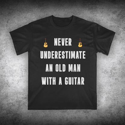Black t-shirt with white text and guitar graphics on a textured gray background